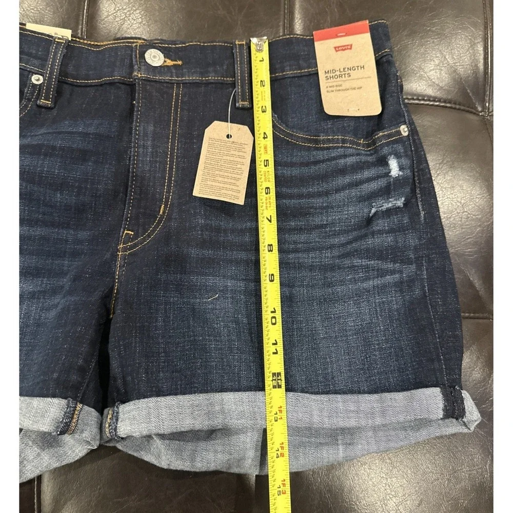 Levi's Women Size 33 Mid Length Blue Denim Shorts Cuffed Dark Distressed Stretch